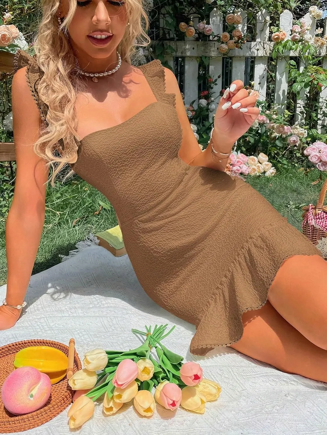 WDIRARA Women's Boho Backless Knot Ruffle Hem High Waist Trim Textured Mini Dress
