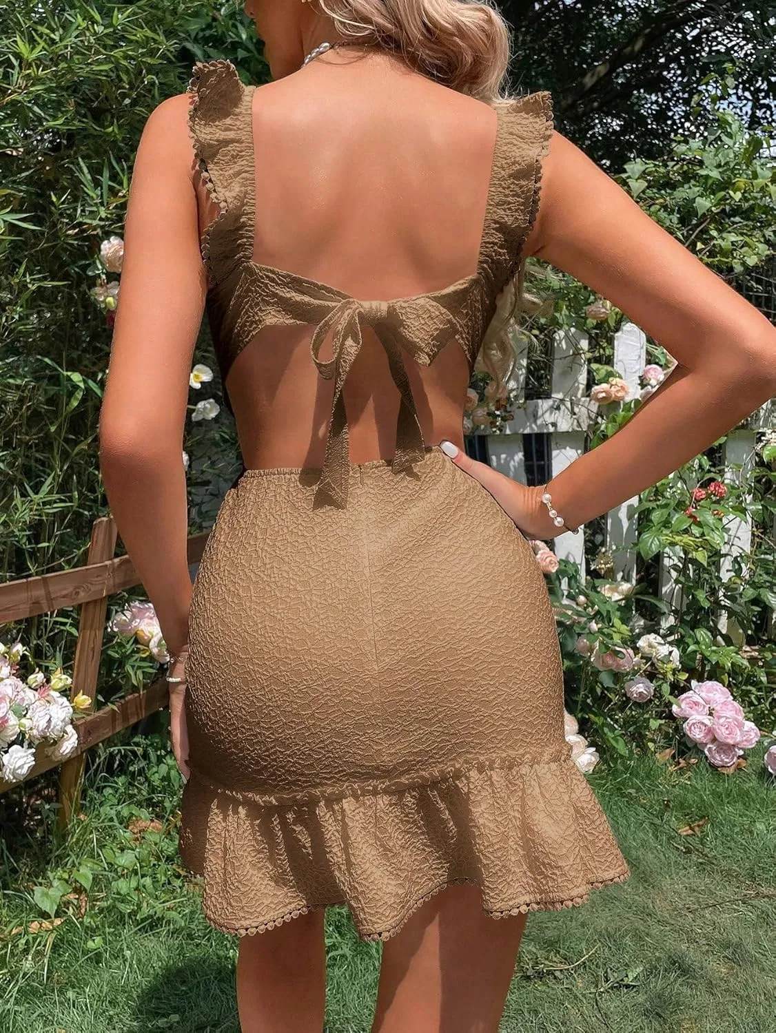 WDIRARA Women's Boho Backless Knot Ruffle Hem High Waist Trim Textured Mini Dress
